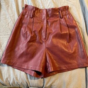 Burgundy faux leather shorts